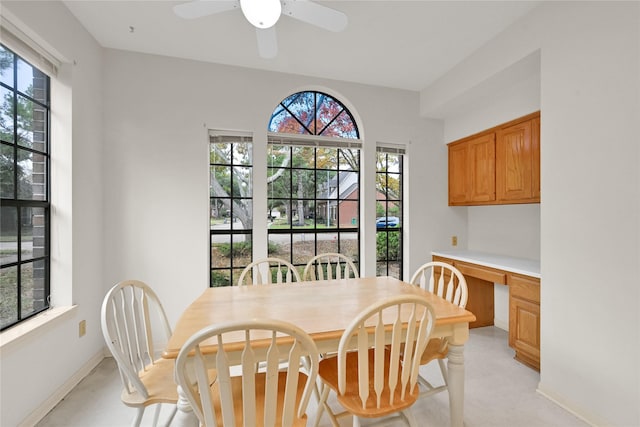7810 Timberline Run Ln, Houston, TX 77095 - dining area featuring plenty of natural light, built in study area, and ceiling fan