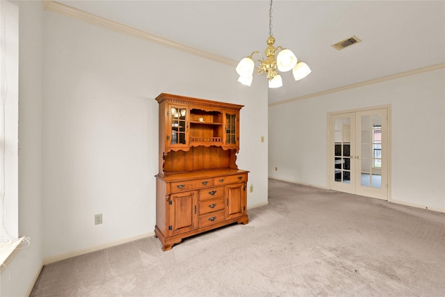 7810 Timberline Run Ln, Houston, TX 77095 - spare room with a chandelier, light carpet, french doors, and ornamental molding