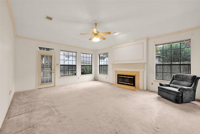 7810 Timberline Run Ln, Houston, TX 77095 - unfurnished living room with carpet, plenty of natural light, a ceiling fan, and ornamental molding