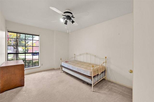 7810 Timberline Run Ln, Houston, TX 77095 - bedroom with carpet and ceiling fan