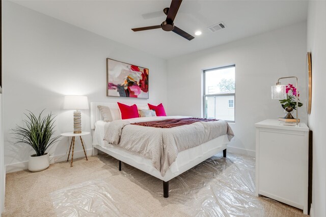 carpeted bedroom featuring ceiling fan