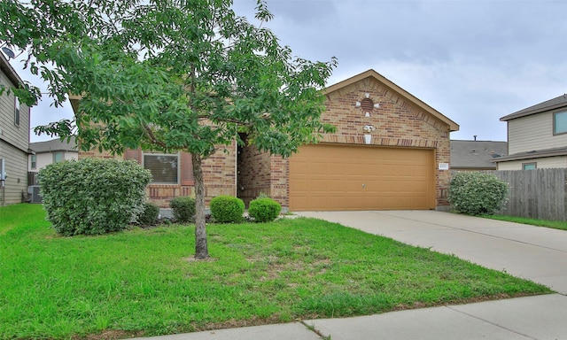 view of front of property featuring central air condition unit, a front lawn, and a garage