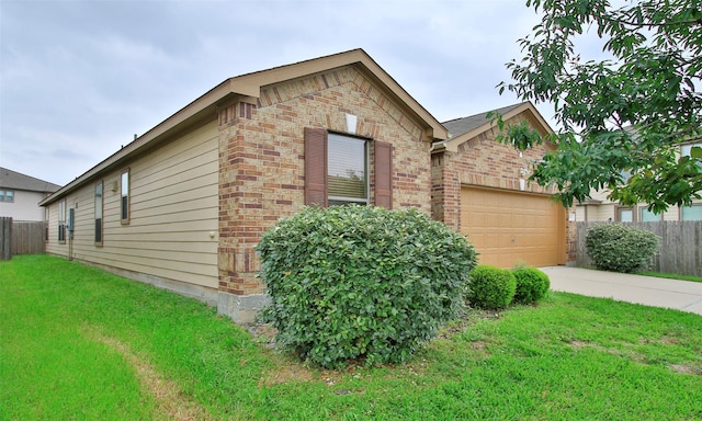 exterior space with a front lawn and a garage