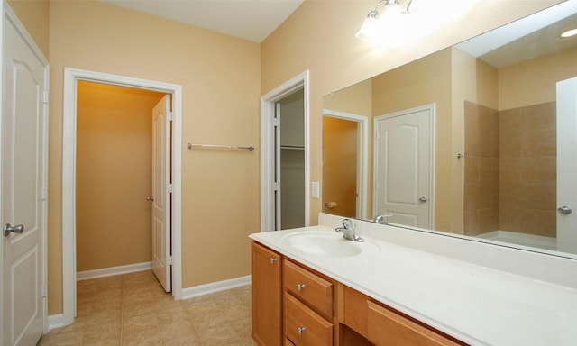 bathroom featuring tile patterned floors and vanity