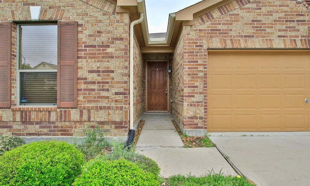 property entrance featuring a garage