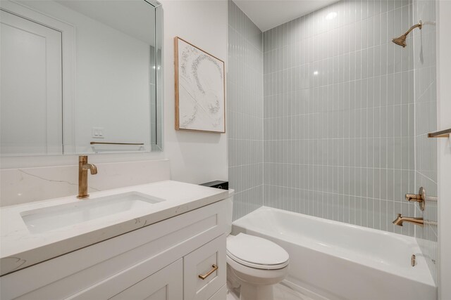 full bathroom with toilet, vanity, and bathtub / shower combination