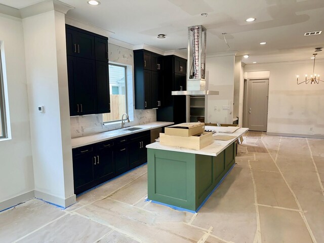 kitchen with ornamental molding, tasteful backsplash, visible vents, and a sink