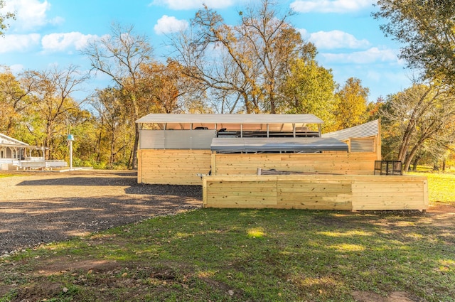 view of poultry coop with a lawn