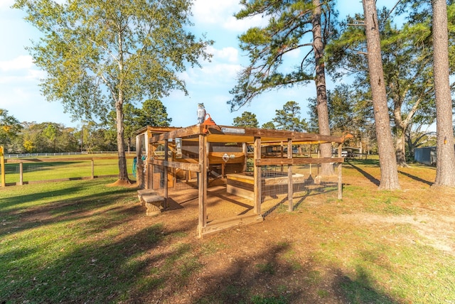 exterior space with a yard and fence