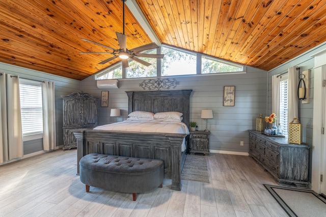 bedroom featuring vaulted ceiling with beams, light wood-style floors, wooden ceiling, a wall mounted air conditioner, and baseboards