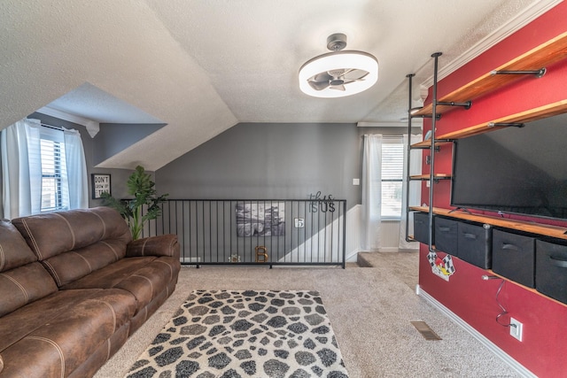 carpeted living room with a textured ceiling, vaulted ceiling, visible vents, and baseboards