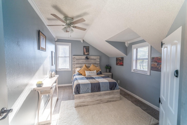 bedroom featuring ornamental molding, carpet flooring, a textured ceiling, and multiple windows