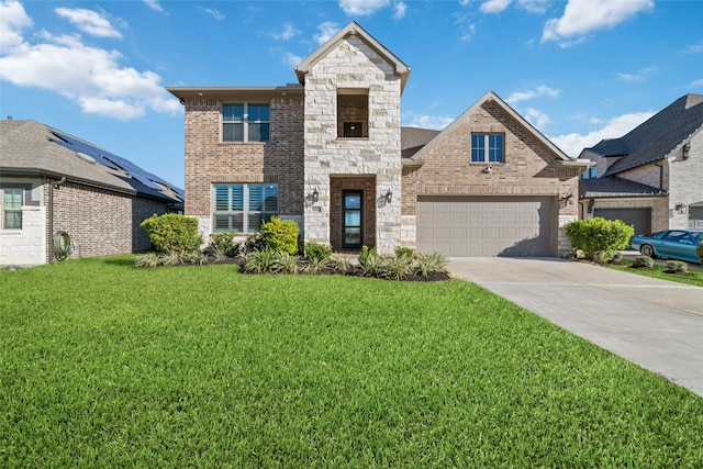 view of front of home with a garage and a front yard