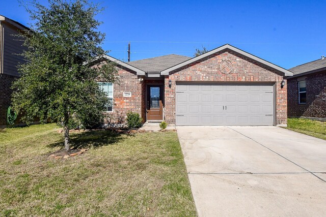 single story home featuring a front lawn and a garage