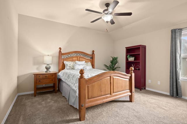 carpeted bedroom featuring vaulted ceiling and ceiling fan