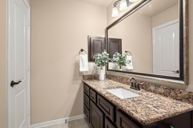 bathroom featuring tile patterned floors and vanity