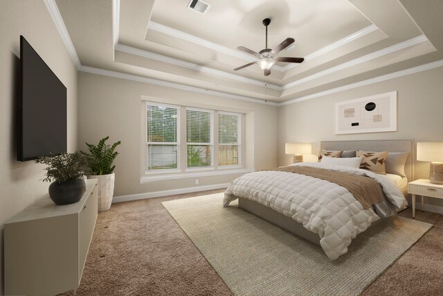 carpeted bedroom with ceiling fan, ornamental molding, and a tray ceiling