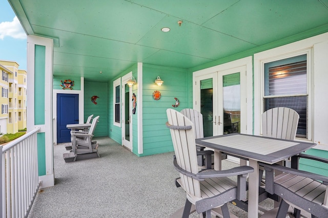 view of patio / terrace featuring french doors and a porch