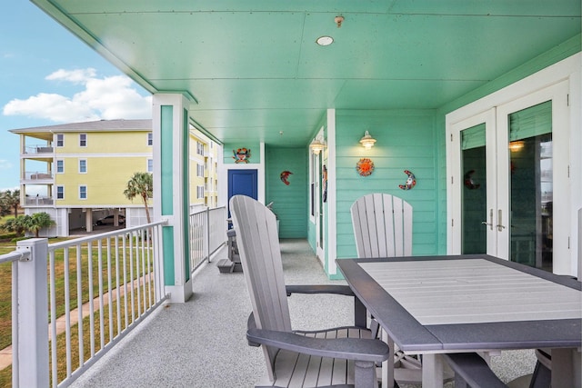 balcony featuring french doors