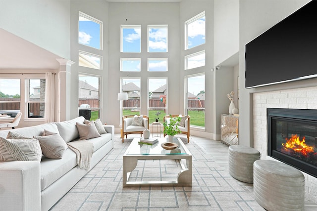 interior space featuring a towering ceiling and a wealth of natural light