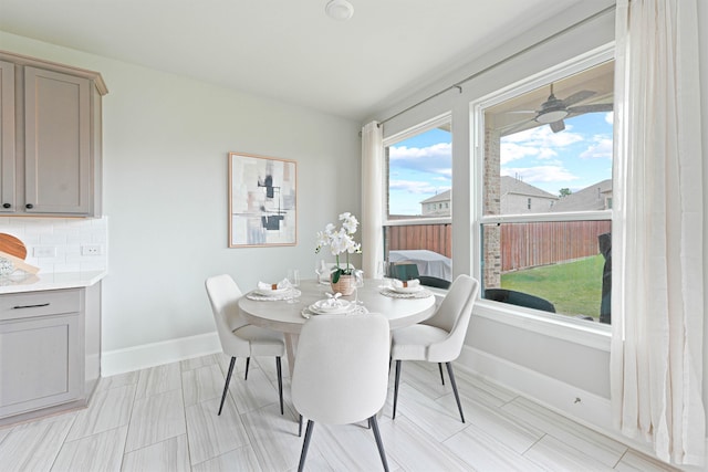 dining area featuring ceiling fan