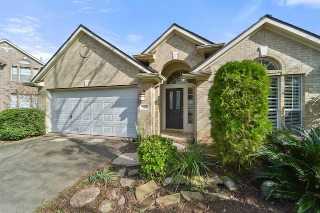 view of front of property featuring a garage