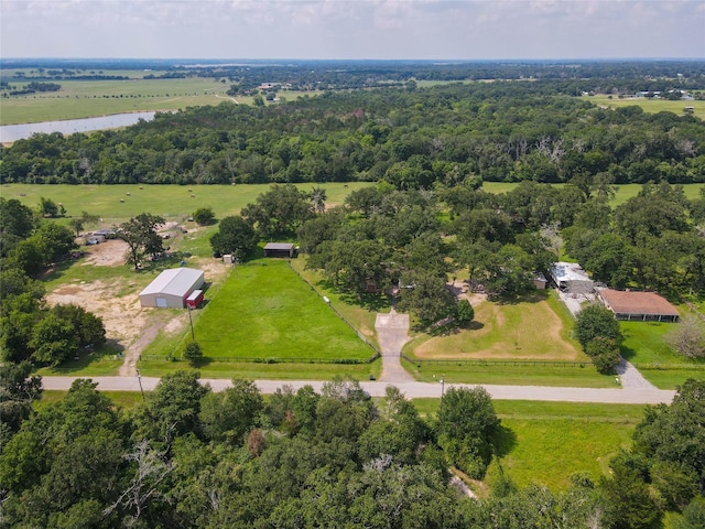 aerial view with a rural view and a water view