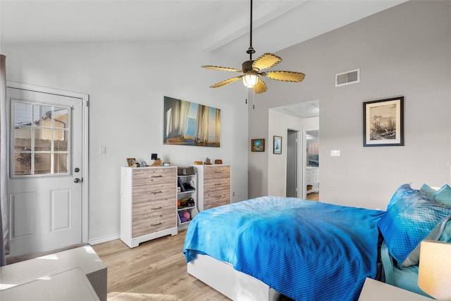 bedroom featuring hardwood / wood-style floors, ceiling fan, and vaulted ceiling with beams