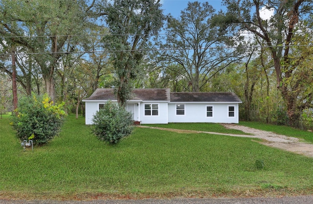 view of front of property with a front lawn