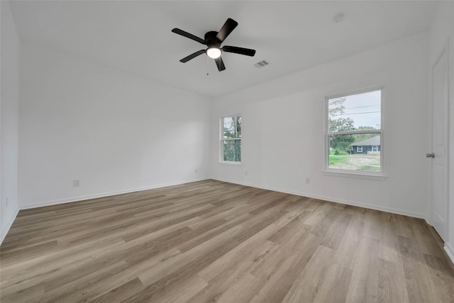 unfurnished room with ceiling fan and light hardwood / wood-style floors