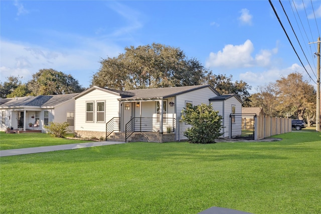 ranch-style house featuring a front lawn