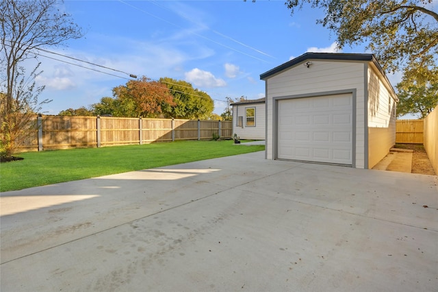 garage featuring a yard