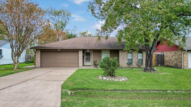 ranch-style house with a front yard and a garage