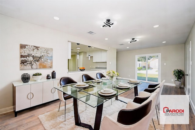 dining area featuring light hardwood / wood-style floors