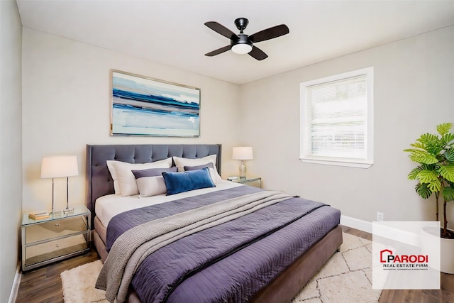 bedroom featuring ceiling fan and hardwood / wood-style flooring