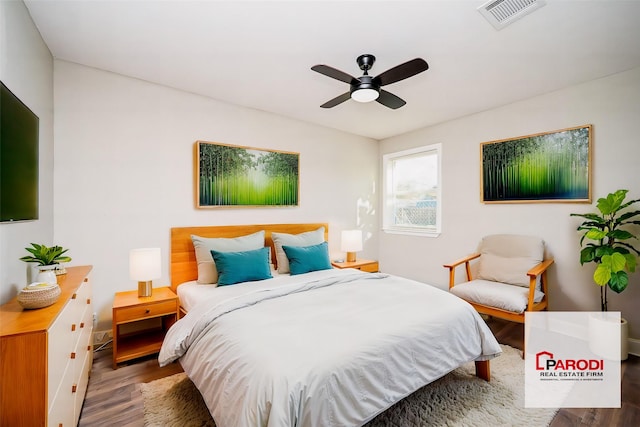 bedroom featuring ceiling fan and wood-type flooring