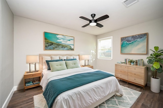 bedroom with dark wood-type flooring and ceiling fan