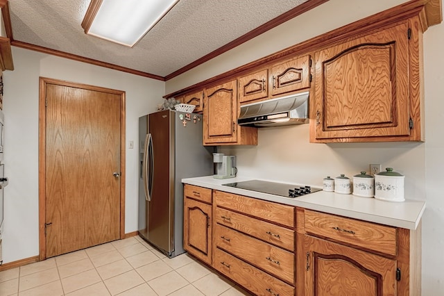 kitchen featuring stainless steel fridge, a textured ceiling, black electric cooktop, light tile patterned floors, and ornamental molding