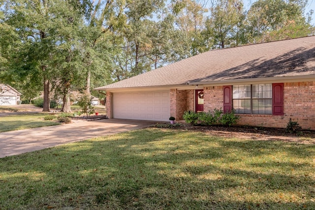 single story home featuring a front lawn and a garage