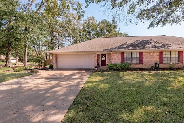 ranch-style home featuring a front yard and a garage