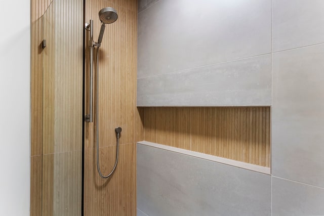 room details with a tile shower