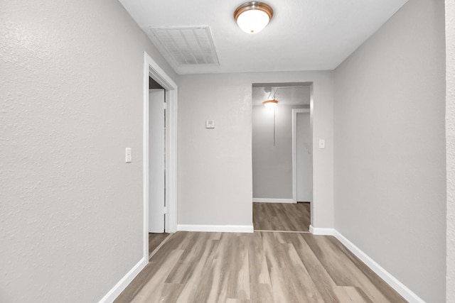 hall featuring light wood-type flooring