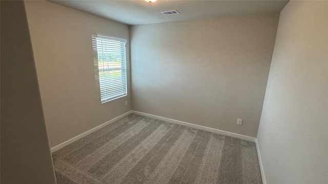 2925 Terrace Grove Dr, Conroe, TX 77304 - carpeted empty room with baseboards