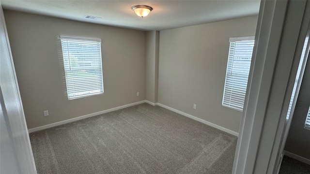 2925 Terrace Grove Dr, Conroe, TX 77304 - spare room with carpet flooring and baseboards