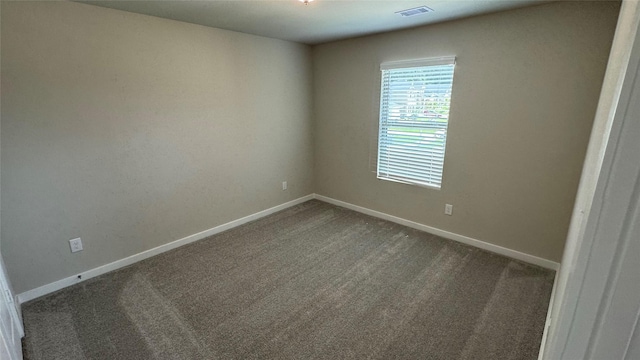 2925 Terrace Grove Dr, Conroe, TX 77304 - empty room featuring dark carpet