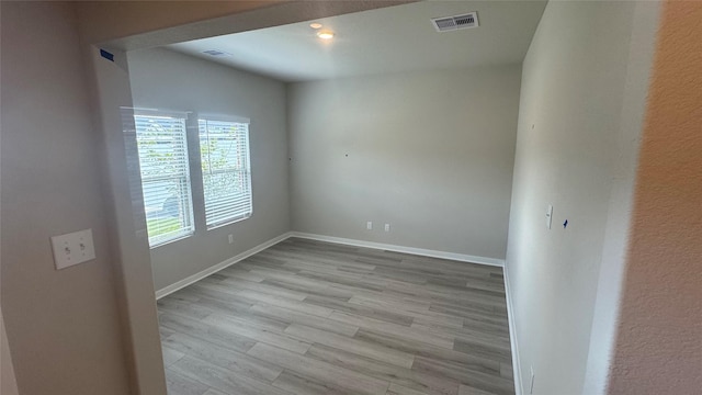 2925 Terrace Grove Dr, Conroe, TX 77304 - unfurnished room with wood finished floors and baseboards