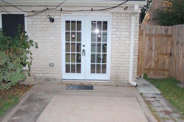 doorway to property featuring a patio area and french doors