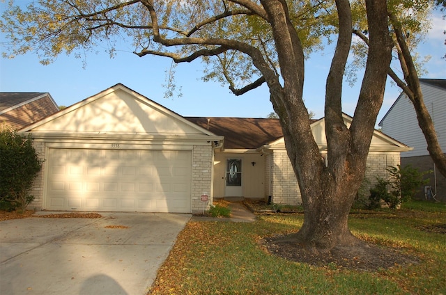 single story home with a garage