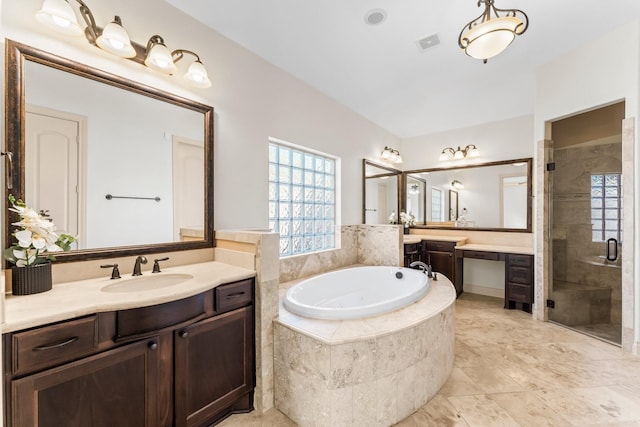 bathroom featuring vanity and plus walk in shower