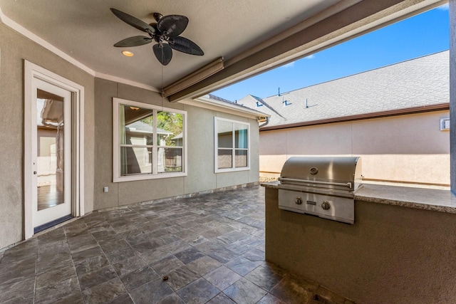 view of patio with a grill and ceiling fan